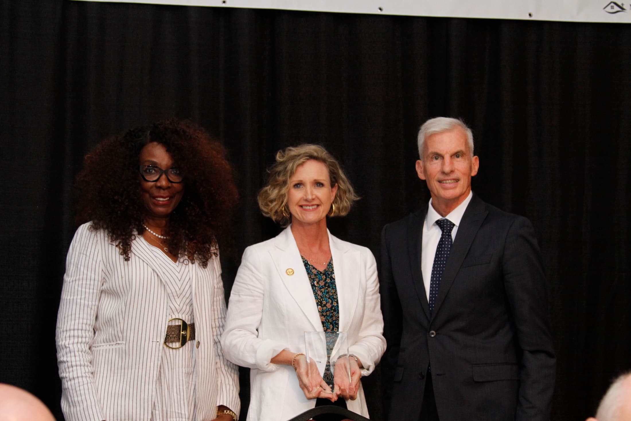 Dr. Carrie L. Castille speaking at NOVA's ninth annual luncheon