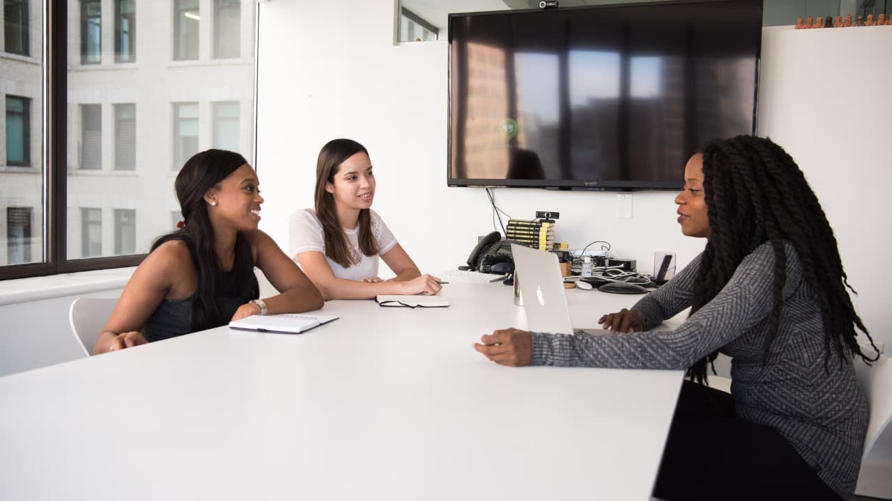 Women meeting around a conference table