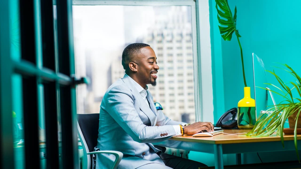 A professional working at a desk