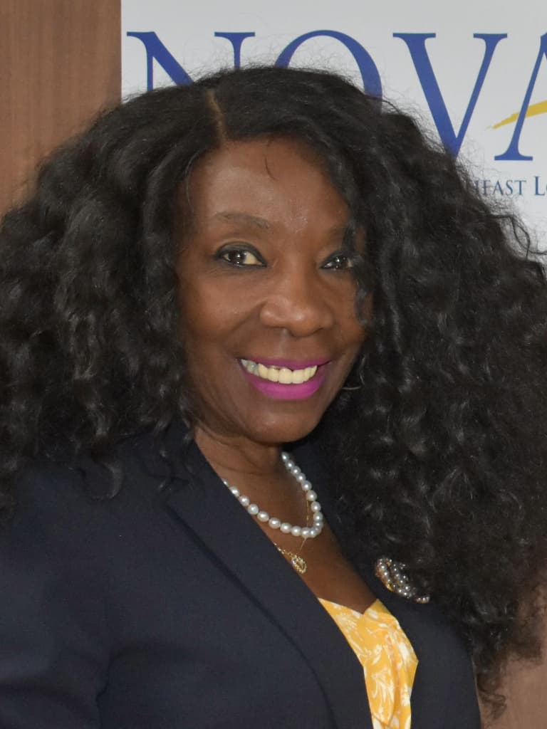Juanita G. Woods, Deputy Director & Director of Programs & Participant Services